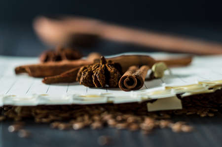 Fresh coffee beans and star anise, cinnamon.の写真素材
