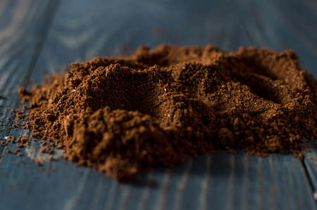 ground coffee beans scattered.の写真素材