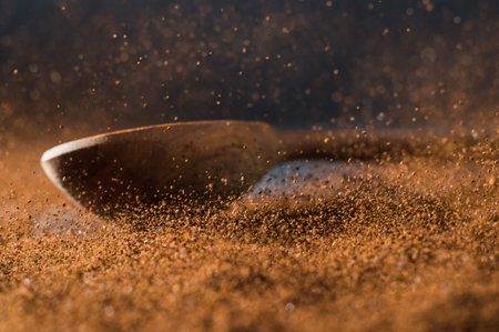ground coffee beans scattered.の写真素材