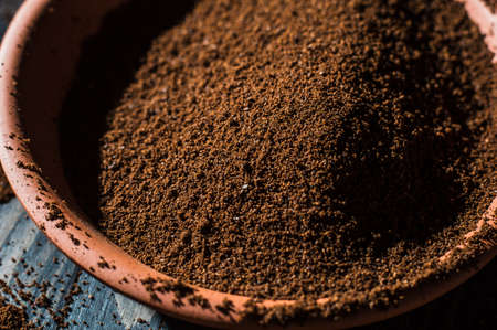 ground coffee beans scattered.の写真素材