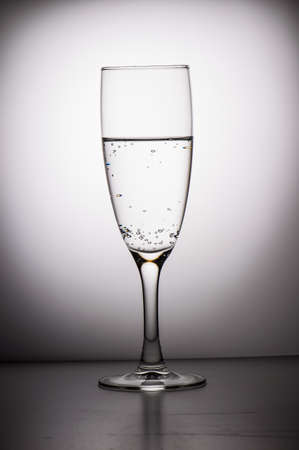 Glass of water on a white background.の写真素材