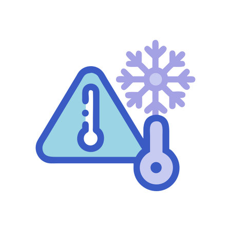 Extreme cold weather warning sign and snowflake icon