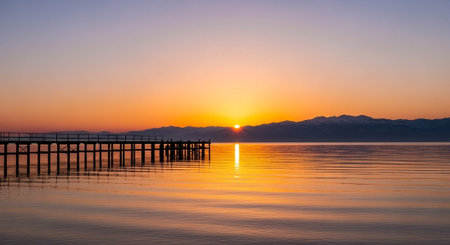 Sunset at the lake Balaton in Hungary with wooden jettyの写真素材
