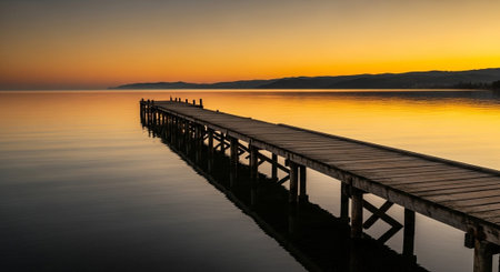 Wooden jetty on Lake Balaton at sunset, Hungary.の写真素材