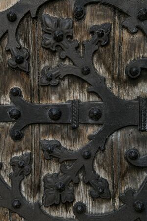 Old wooden background with metal