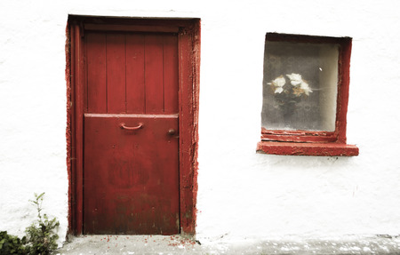 old red doorの写真素材