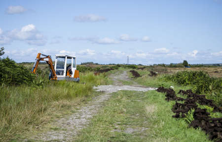 digger in irish countrysideの写真素材