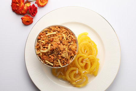 Jalebi and snack in a bowl, Indian tea time snack or breakfastの写真素材