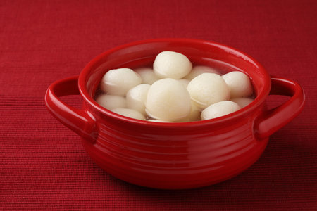 Rasgulla is a one of famous Indian sweet made by Pure Cow milk. This sweet is served chilled and has soft-spongyの写真素材