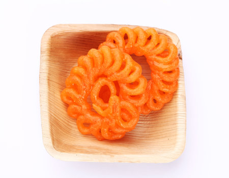 Indian most popular traditional sweet called Jalebi , zulbia or Imarati an Indian dessert made...