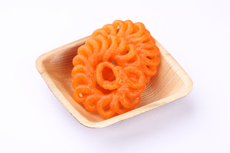 Indian most popular traditional sweet called Jalebi , zulbia or Imarati an Indian dessert made during festivals and celebrations in Indiaの写真素材