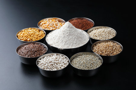 multigrain atta or flour for everyday use at Indian households. wheat, bajra, jowar, corn, rajgira, soyabean, flax seed, chana daal,の写真素材