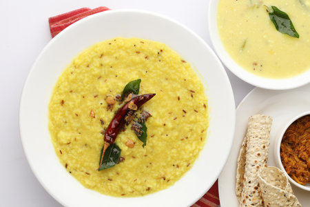 Dal khichadi or Khichdi Tasty Indian recipe made of yellow moong dal and rice . Selective focusの写真素材