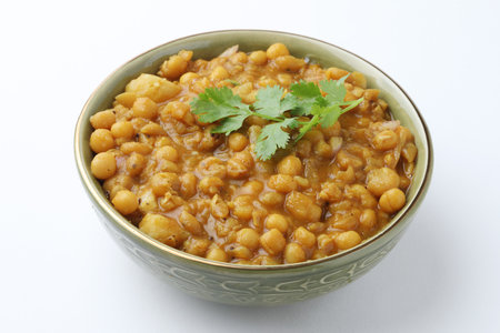 Chole or Chana Masala or Spicy Chickpeas is traditional North Indian main course recipe and usually served with Bhature or Roti Naan.の写真素材