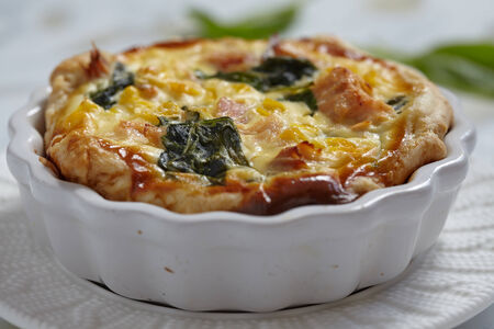 Healthy quiche with salmon, spinach and cornの写真素材
