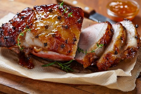 Baked meat with orange fruit jam and allspiceの写真素材