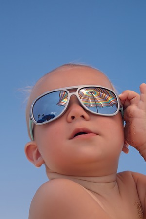 Portrait of adorable baby boy with sunglassesの写真素材
