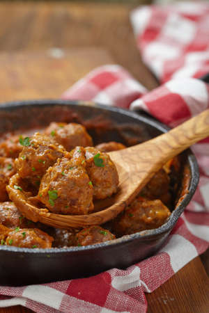 Meatballs with tomato sauce in a panの写真素材