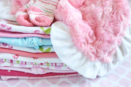 Pink layette for a newborn baby girlの写真素材
