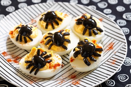 Deviled eggs with a Spider for Halloweenの写真素材