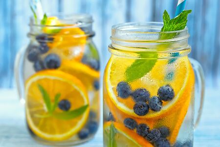 Orange Blueberry Detox Water on wooden tableの写真素材