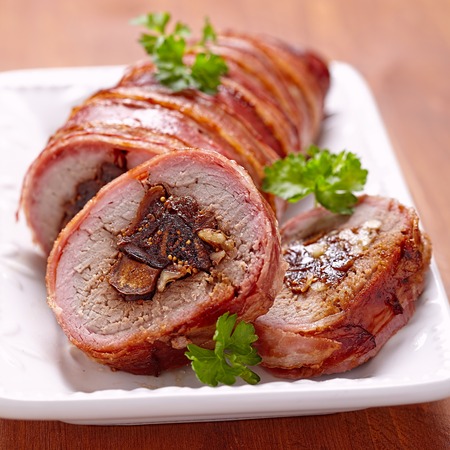 Roasted pork roll stuffed with figs and walnutsの写真素材