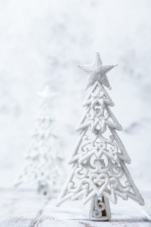 Sparkly glitter Christmas trees in silver and white backgroundの写真素材