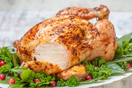 Whole Roasted Chicken on plate for holidaysの写真素材