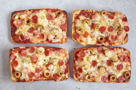 Ciabatta pizza with mini pepperoniの写真素材