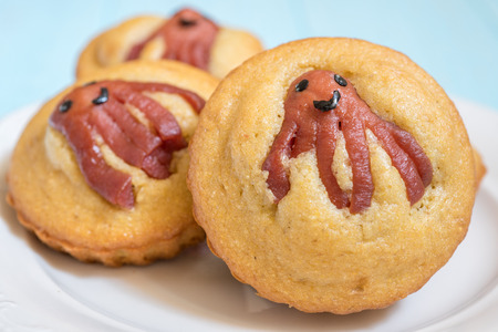 Kid funny food. Cornbread muffins with sausage octopusの写真素材