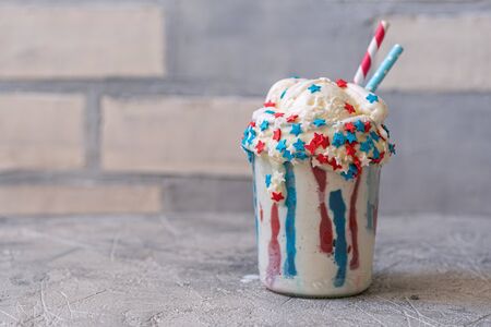 Vanilla funfetti milkshake with ice cream. Patriotic drink cocktailの写真素材
