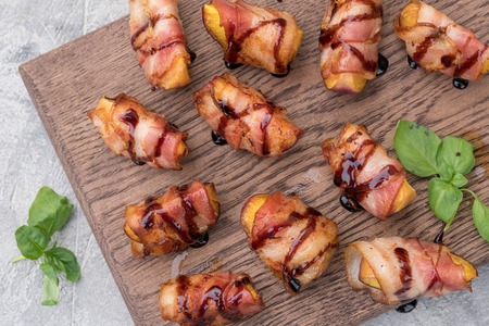 Grilled bacon wrapped peach with balsamic vinegarの写真素材