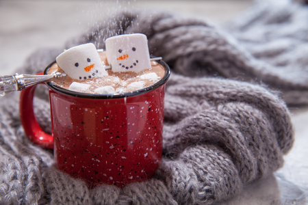 Hot chocolate with melted snowmanの写真素材