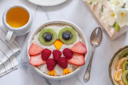 Kids breakfast oatmeal porridgeの写真素材