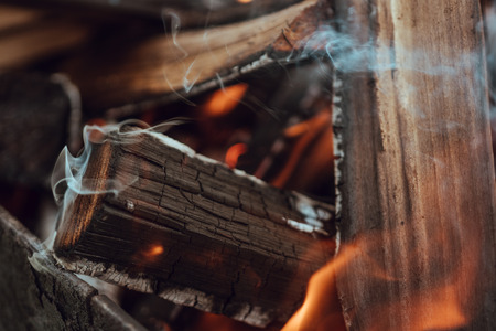flame on burning wood in fireplace