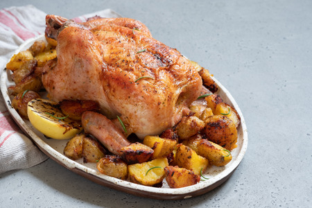 Whole roasted chicken with potato