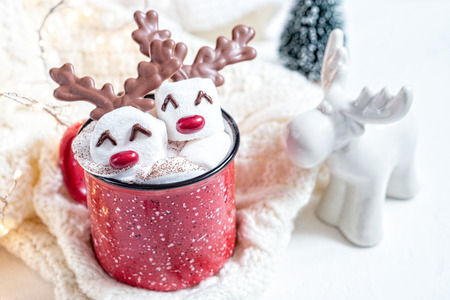 Hot chocolate with melted marshmallow snowmanの写真素材