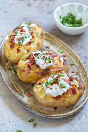 Baked loaded potatoの写真素材