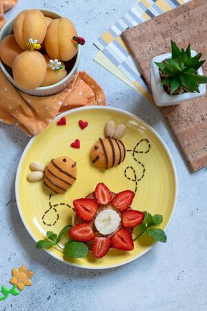 Pancake with fruits for kids breakfastの写真素材