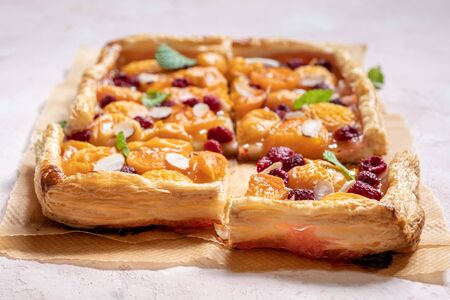 Summer tart with apricots and raspberryの写真素材
