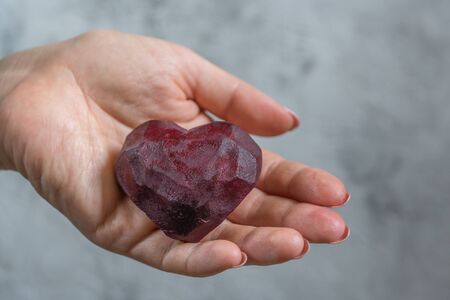 Beet heart in a hand