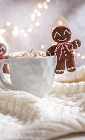 Gingerbread cookie man with a hot chocolateの写真素材