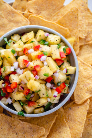 Pineapple salsa with nachosの写真素材
