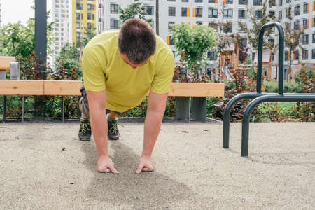 Determined Sportsman during fitness trainingの写真素材