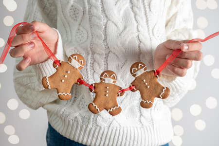 Stay home Christmas gingerbread men with a masksの写真素材