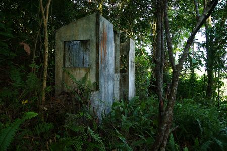 Very old destroyed house is located in jungle at peninsula Santubong coast. Borneo.の写真素材