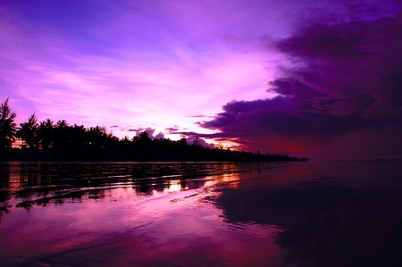 Sea sunset at stony sea coast of Rambungan. Borneo. の写真素材