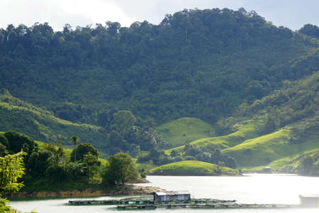 The cleanest blue lake in equatorial jungle of high-mountainous Borneo.の写真素材