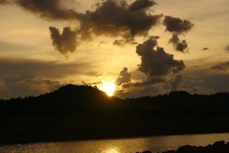 Sunset in a deaf jungle of high-mountainous island Borneoの写真素材