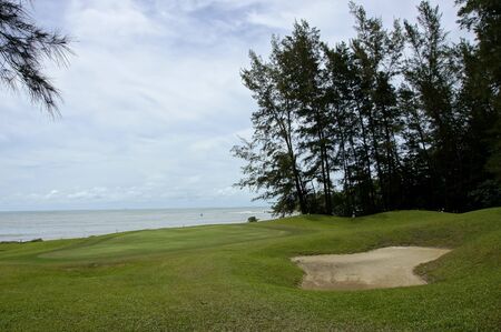 The sea of the coast with jungle of peninsula Santubong. Borneo. の写真素材